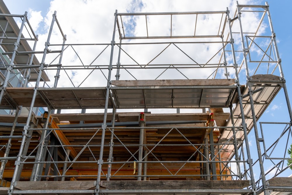 Multi-lift scaffolding and timber formwork on a commercial construction site